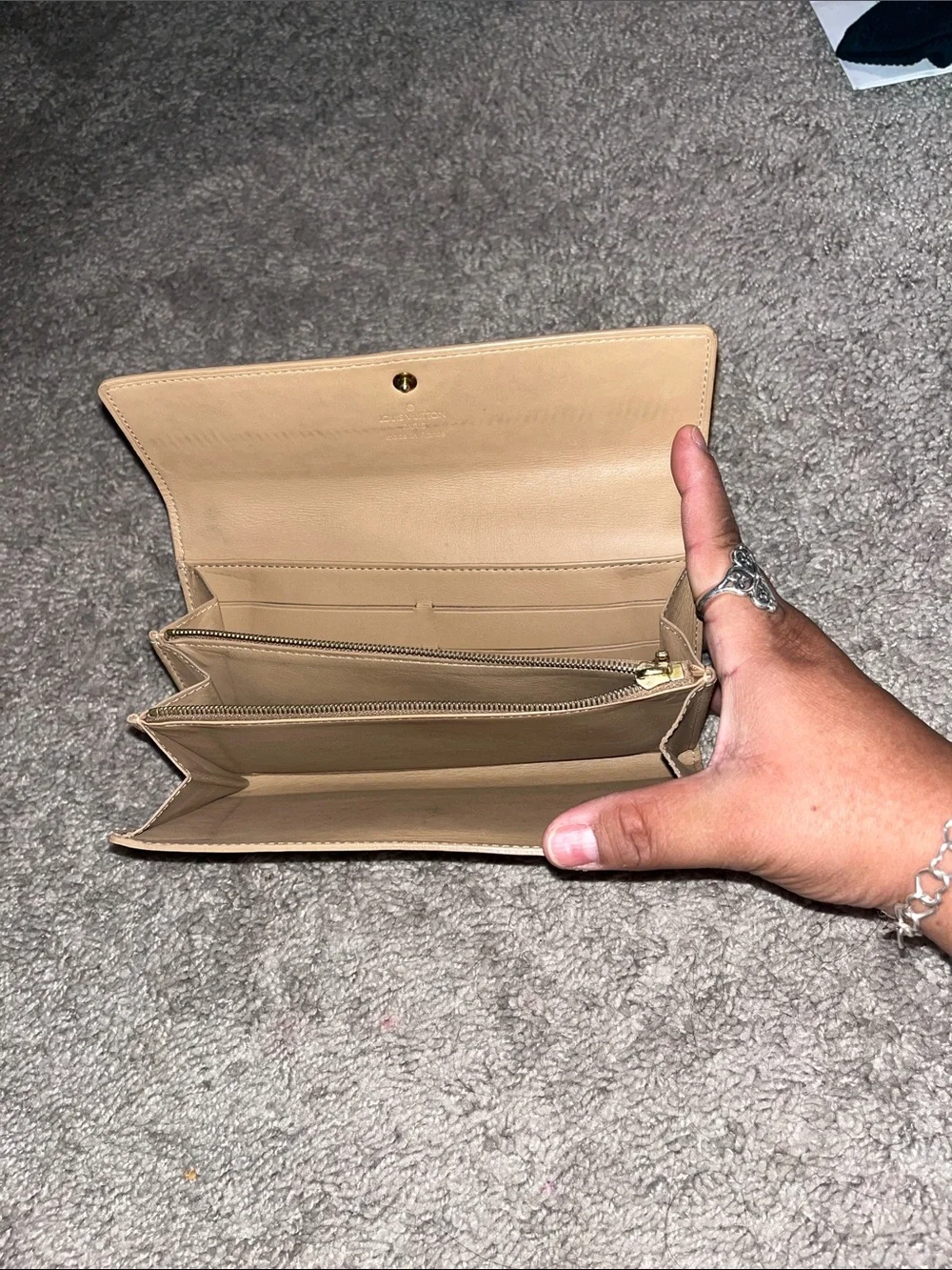 Louis Vuitton sleek leather tan wallet
